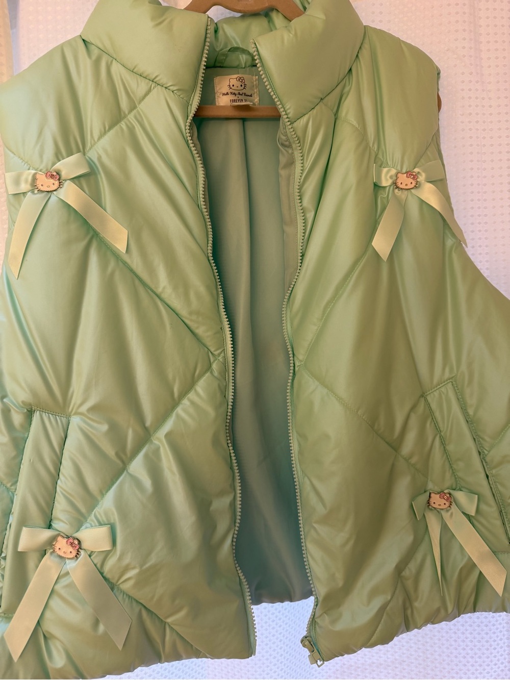 Hello Kitty Light Green Quilted Puffer Vest with Bow Accents